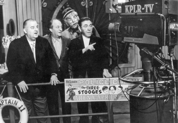 Three Stooges pose with Captain 11